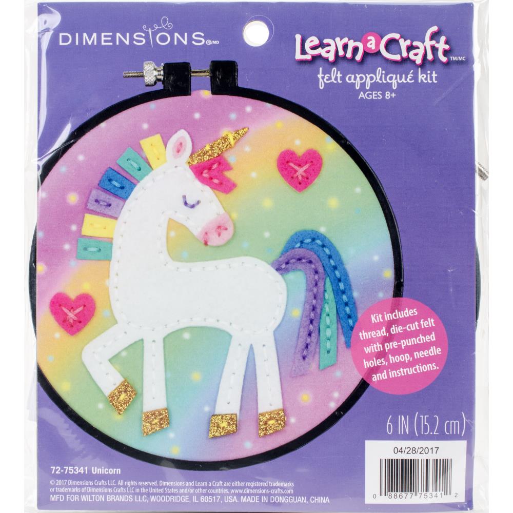 Dimensions Learn a Craft Felt Applique Kit for ages 8+, white & rainbow unicorn design, packaging shown, Kit includes thread, die-cut felt with pre-punched holes, hoop, needle and instructions