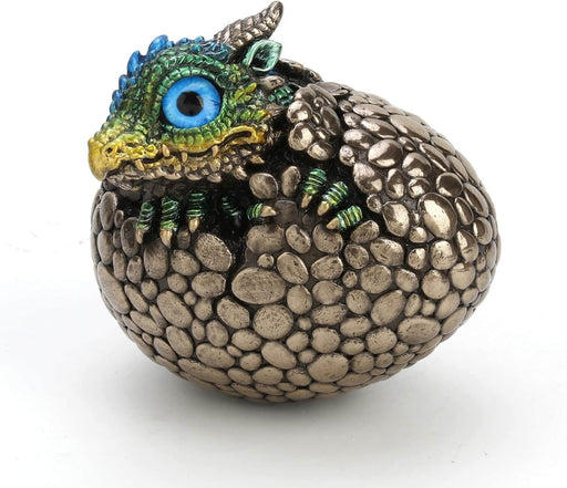 Green-blue-yellow baby dragon with blue eye hatching from metallic egg