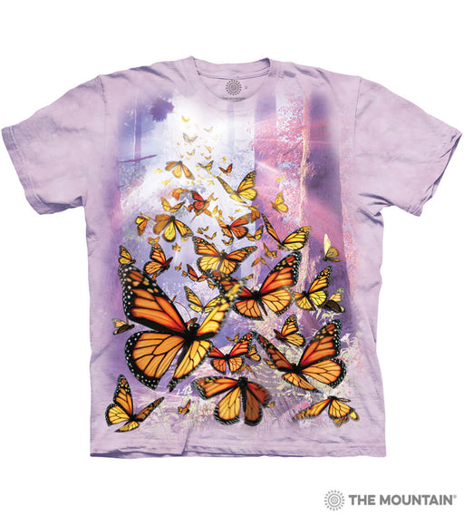 Pale purple-pink mottled t-shirt with orange and black monarch butterflies in a forest