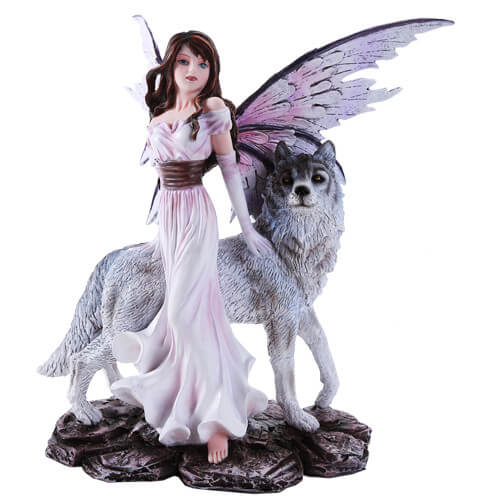 A fairy in a pale pink dress and wings with dark brown hair stands with her wolf companion
