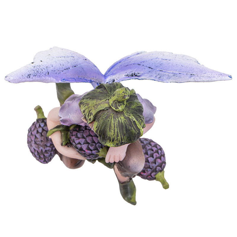 Fairy boy figurine with purple wings, green flower bud hat, holding a berry with more berries next to him. Shown top down