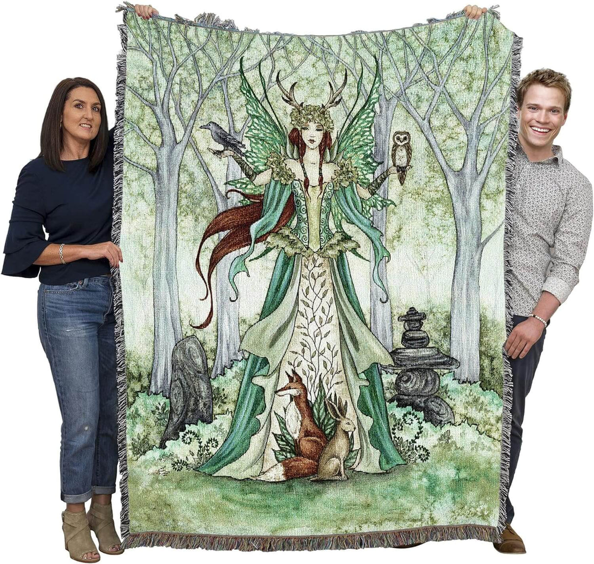 Tapestry blanket held by two adults to show large size