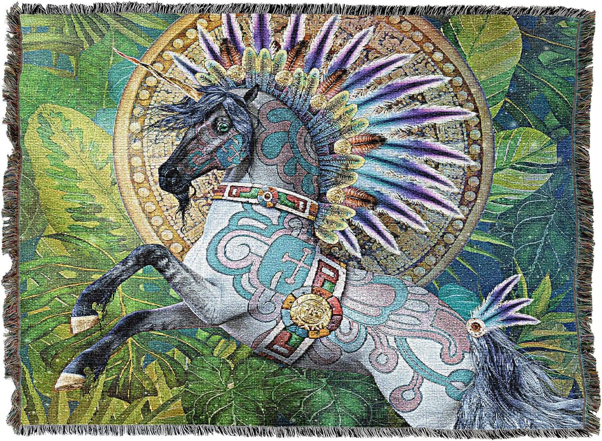 Tapestry Blanket by Laurie Prindle, gray unicorn with feather mane and Aztec style pattern, set against green jungle leaves