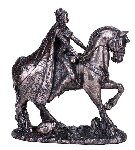 Figurine of Rhiannon from Welsh mythology, riding a horse in ornate garb. A badger is underfoot, half in a bag.
