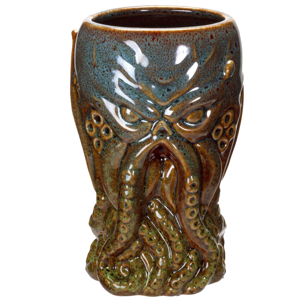 Ceramic Cthulhu pint glass mug with greenish tentacles, brown underlayer and blue on top