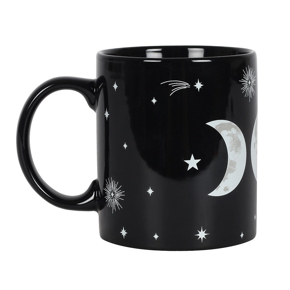 Black ceramic mug with white triple moon and star designs