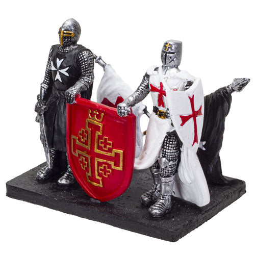 Figurine and card holder with two knights (one in black and one in white) holding up a red shield.