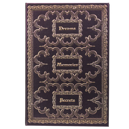 Journal with cover in dark red-brown and gold embossed, words "Dreams", "Memories", and "Secrets"