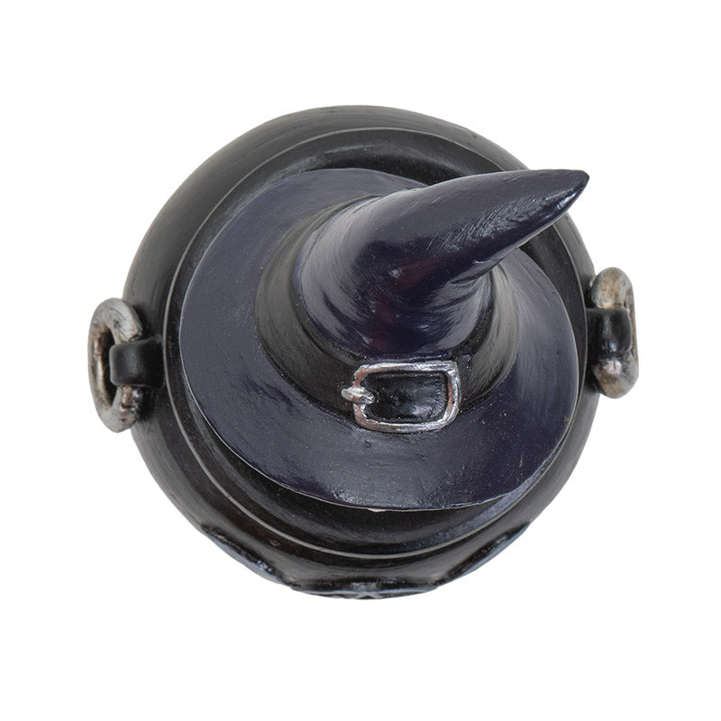 Trinket box of a gray cauldron with gold moon and pentagram, and cat in witch hat on the lid, shown top down