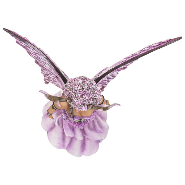 Fairy figurine in pink with braided hair and flower petal wings, shown from the top