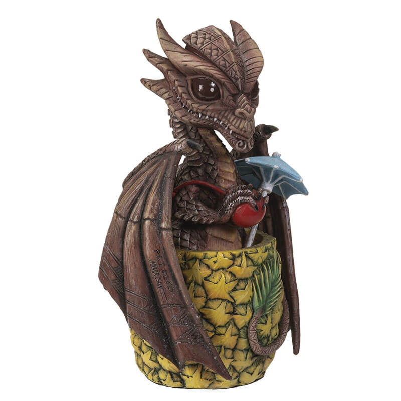 Mai Tai dragon with brown scales sitting in pineapple holding a cherry, with a blue drink umbrella