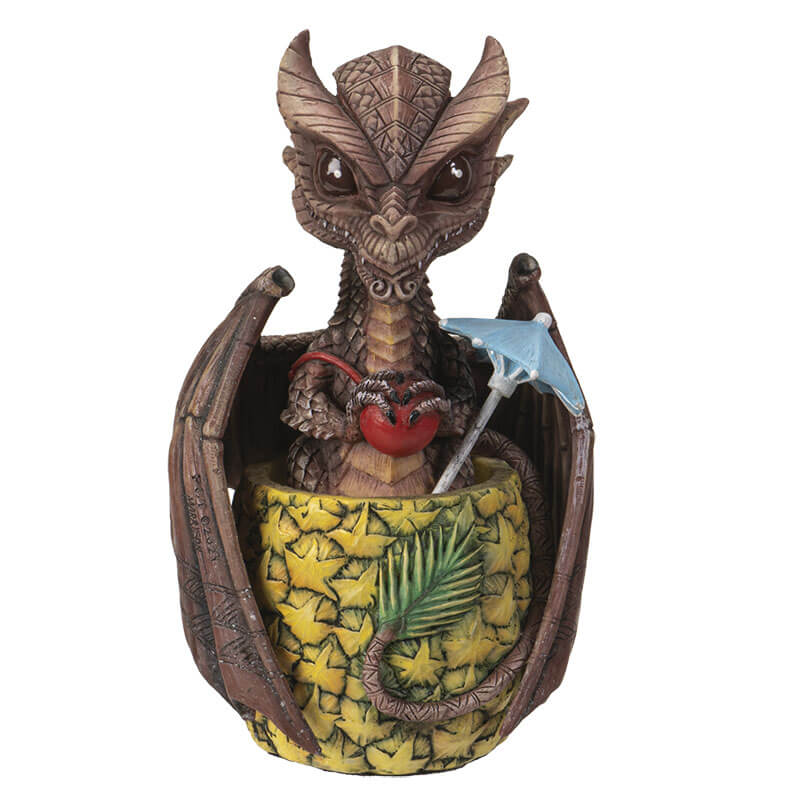 Mai Tai dragon with brown scales sitting in pineapple holding a cherry, with a blue drink umbrella