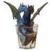 Two headed gin & tonic dragon with blue and brown heads, sitting in glass of clear resin drink