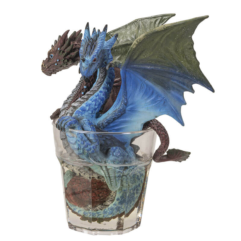 Two headed gin & tonic dragon with blue and brown heads, sitting in glass of clear resin drink