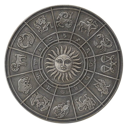 Faux stone resin wall plaque, circular, showing zodiac signs and symbols with a sun at the center