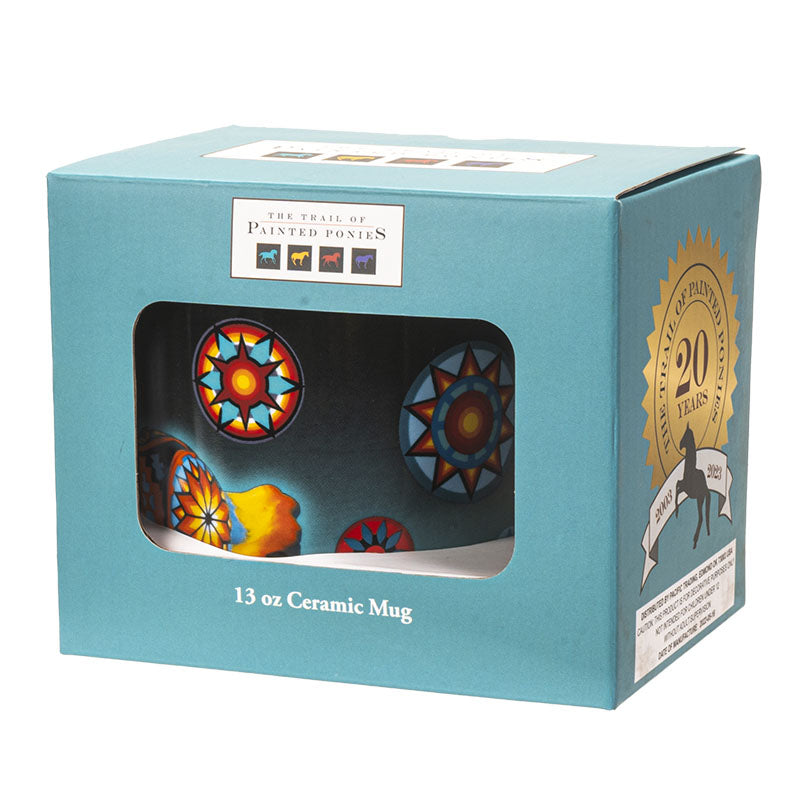 Ceramic mug packaging with colorful design and Trail of Painted Ponies logo