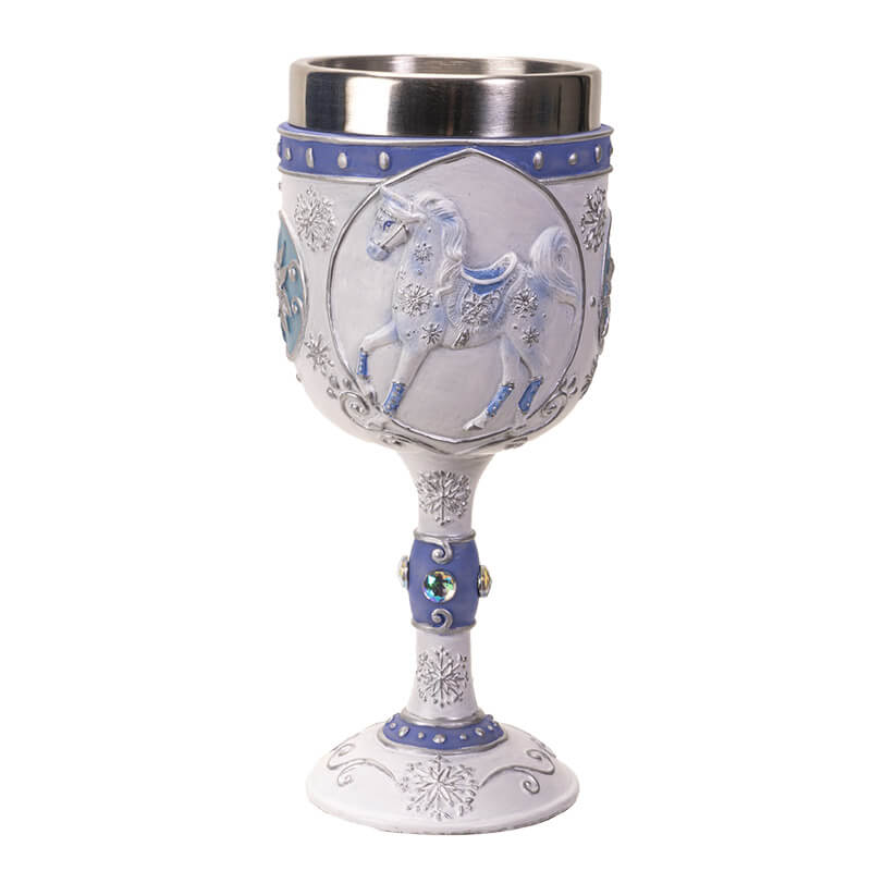 Goblet with stainless steel insert featuring a white horse with blue accents and silver snowflakes, jewels on the drinkware's stem