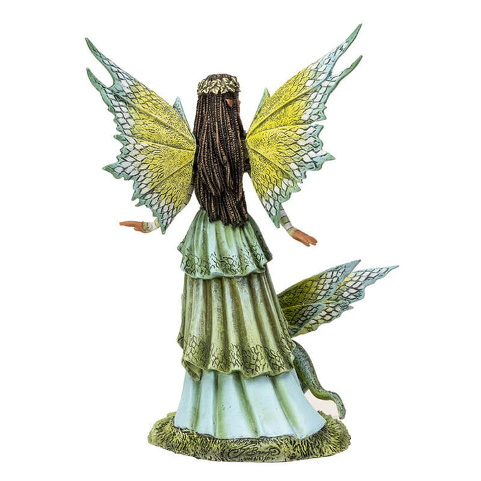 Figurine of a fairy dressed in green with matching wings and dragon. She has tanned skin and braided brown hair. Shown from the back