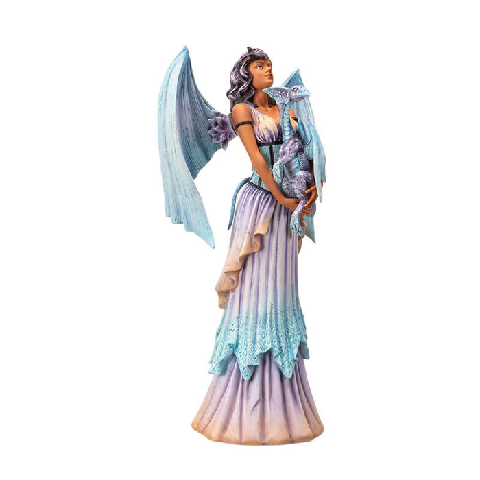 Figurine of a fairy with pale blue dragon wings and purple hair holding a dragon