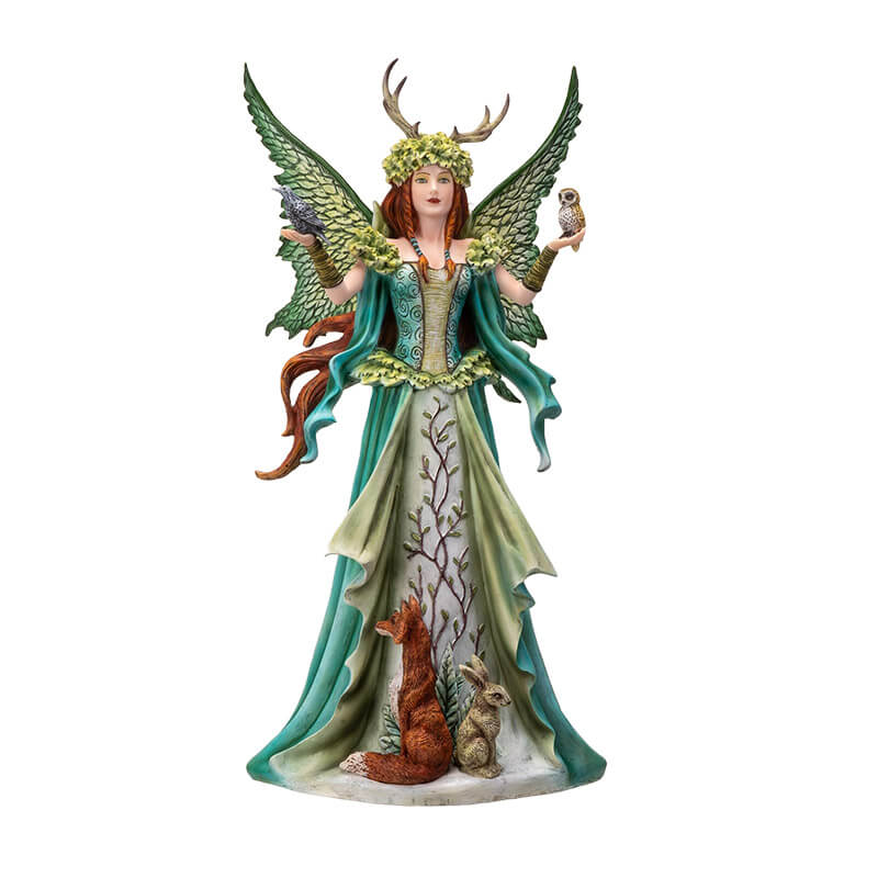Figurine of a redhaired fairy in a green nature themed dress with birds in her hands and a fox and rabbit.