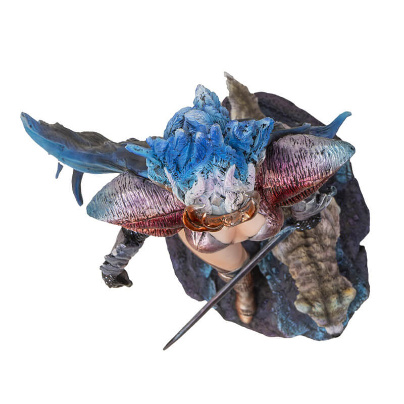 Figurine of a woman in a bodysuit with long flowing black-blue hair striding forth with a sword and a wolf at her side. Shown top-down