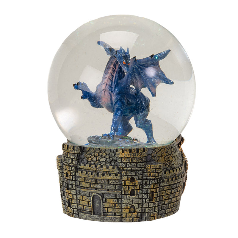 Snowglobe with blue dragon with red eyes within, castle base