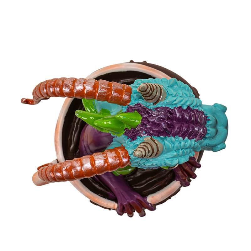 Top down view of dragon's head coming out of mug