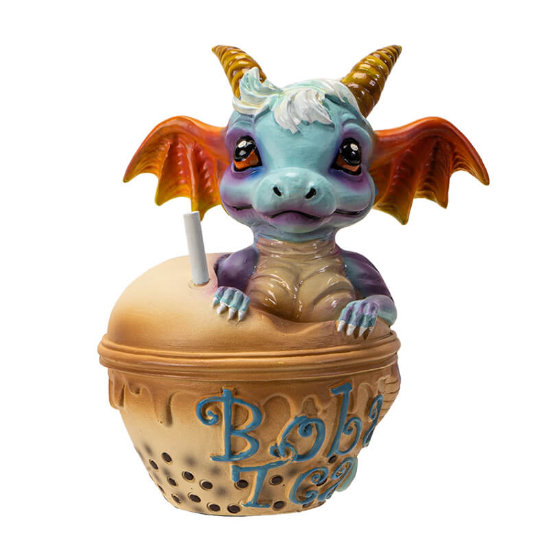 Figurine of blue dragon with red and gold accents sitting in Boba Tea (labeled in blue)