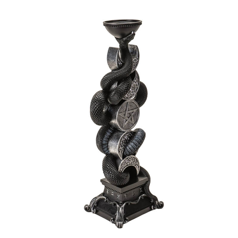 Candleholder of black snake twining through moon phases in silver with spot for taper candle at the top.