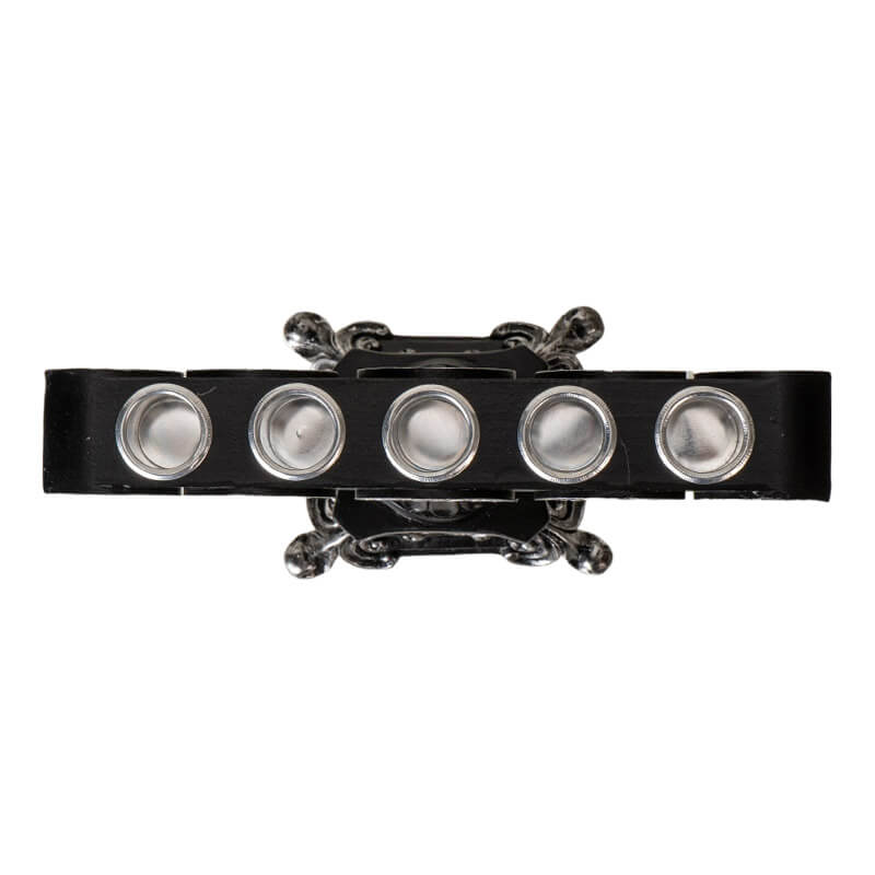 Candle holder with space for five candles. Silver moons and pentagram on black base. Shown top down, showing spots for candles