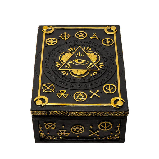 Trinket box in black and gold with Eye of Providence design and arcane symbols