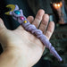 Magic wand in pale purple with orbs in gold, blue and pink with golden crescent moon topper
