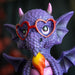 Closeup of purple dragon face, fire, red heart glasses