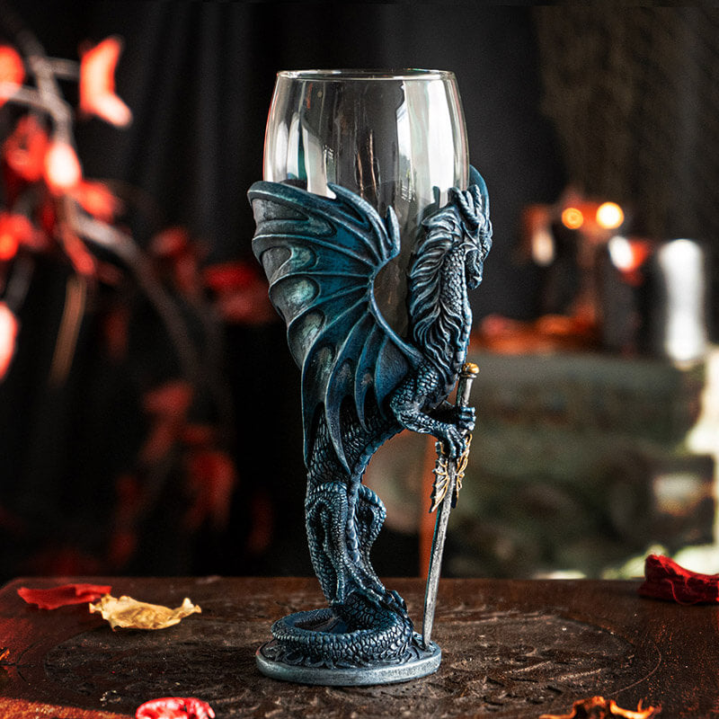 Goblet with glass on top, blue dragon holding a sword forming the stem
