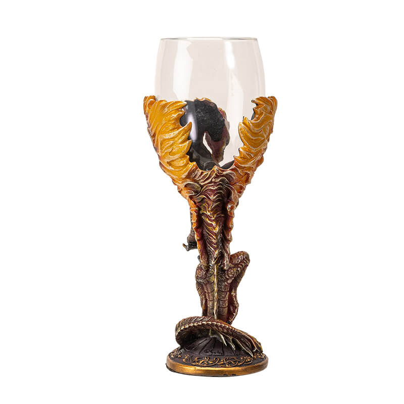 Goblet with glass at the top, fire dragon with sword forming the stem