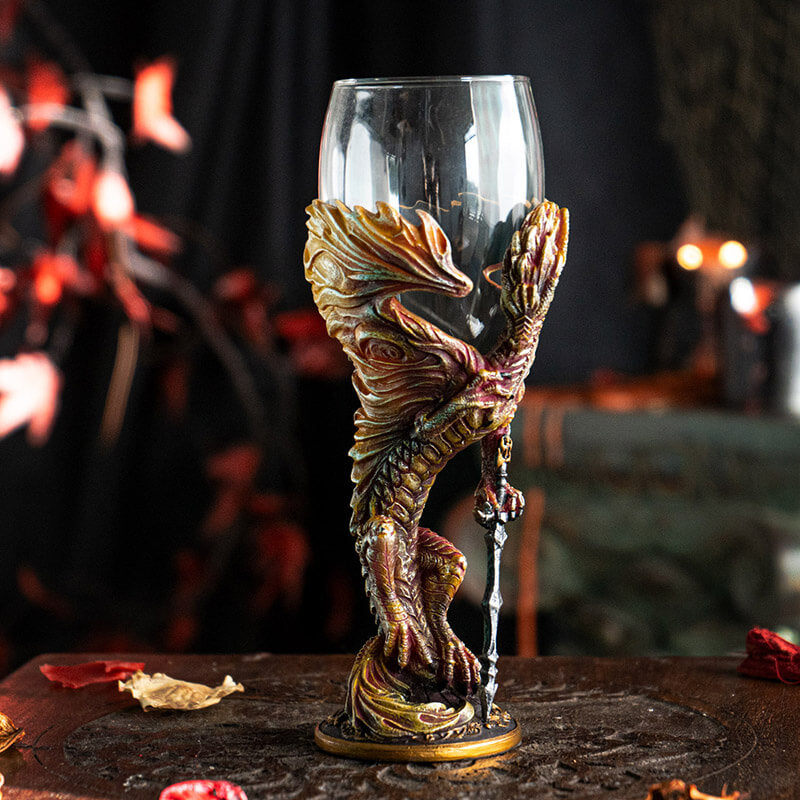 Goblet with glass at the top, fire dragon with sword forming the stem