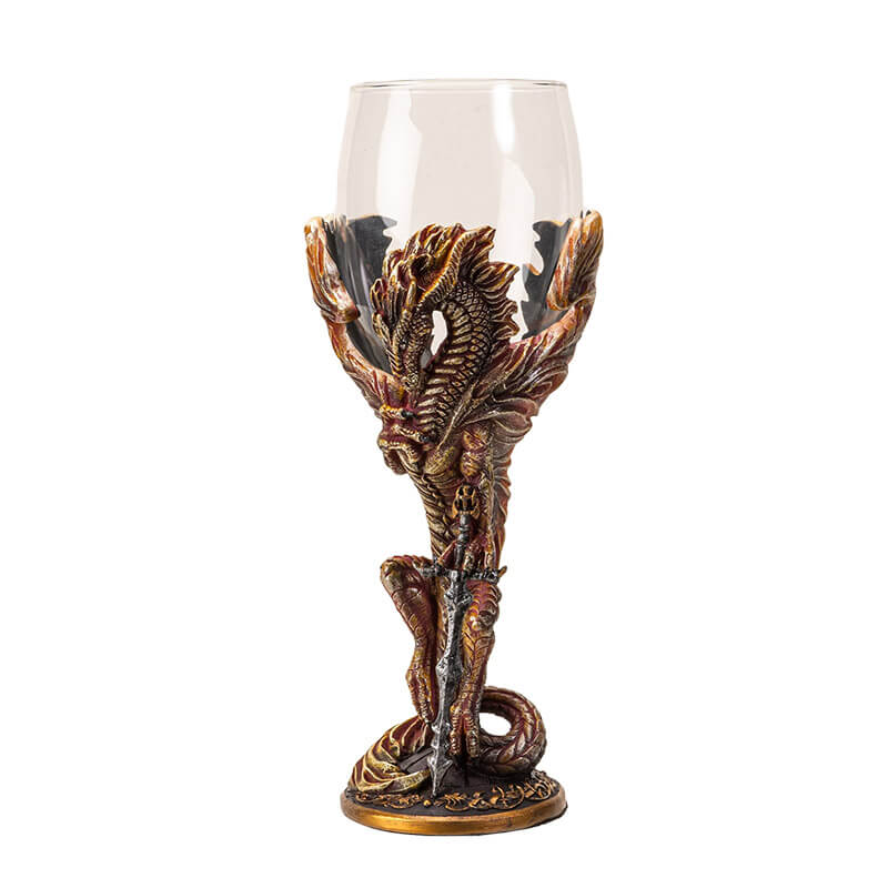 Goblet with glass at the top, fire dragon with sword forming the stem