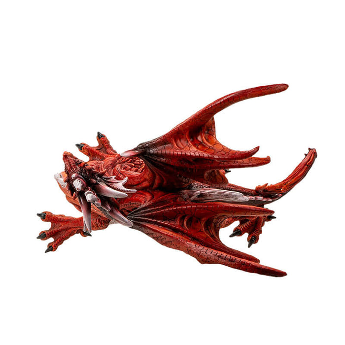 Large red dragon figurine with open mouth and curling tail, detailed scales and spines. Shown top down