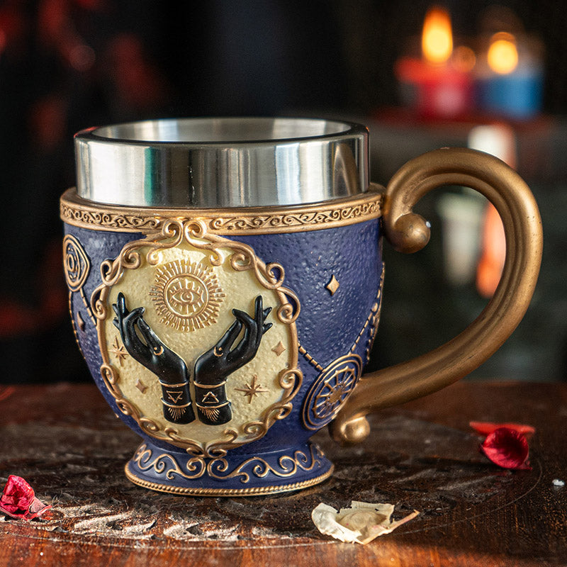 Teacup with stainless steel insert, tarot hands, eye motif, fortune telling themed with gold on blue.