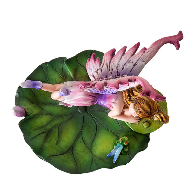 Figurine jewelry dish tray with raised lotus leaf above a pond. Fairy in pink and purple with winged frog on the leaf-dish