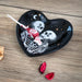 Black ceramic trinket dish with two skeletons, moon and stars