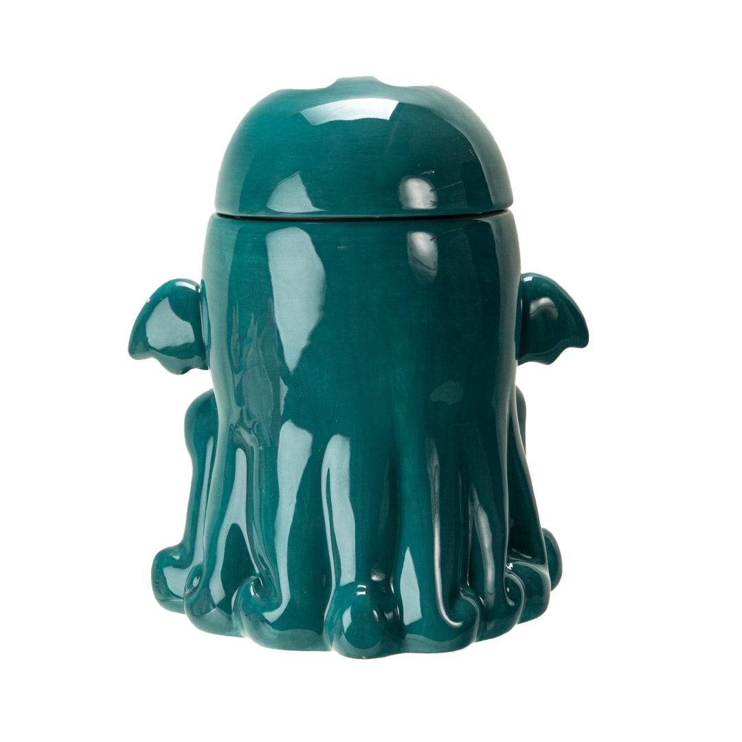 Ceramic cookie jar in teal, pink eyed, tentacled Cthulhu monster shaped, shown from the back