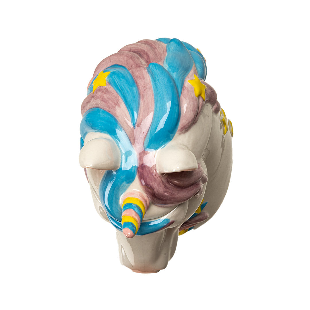 Ceramic unicorn head cookie jar, mane with pink and blue, horn with pink, blue yellow, and yellow stars, shown top down