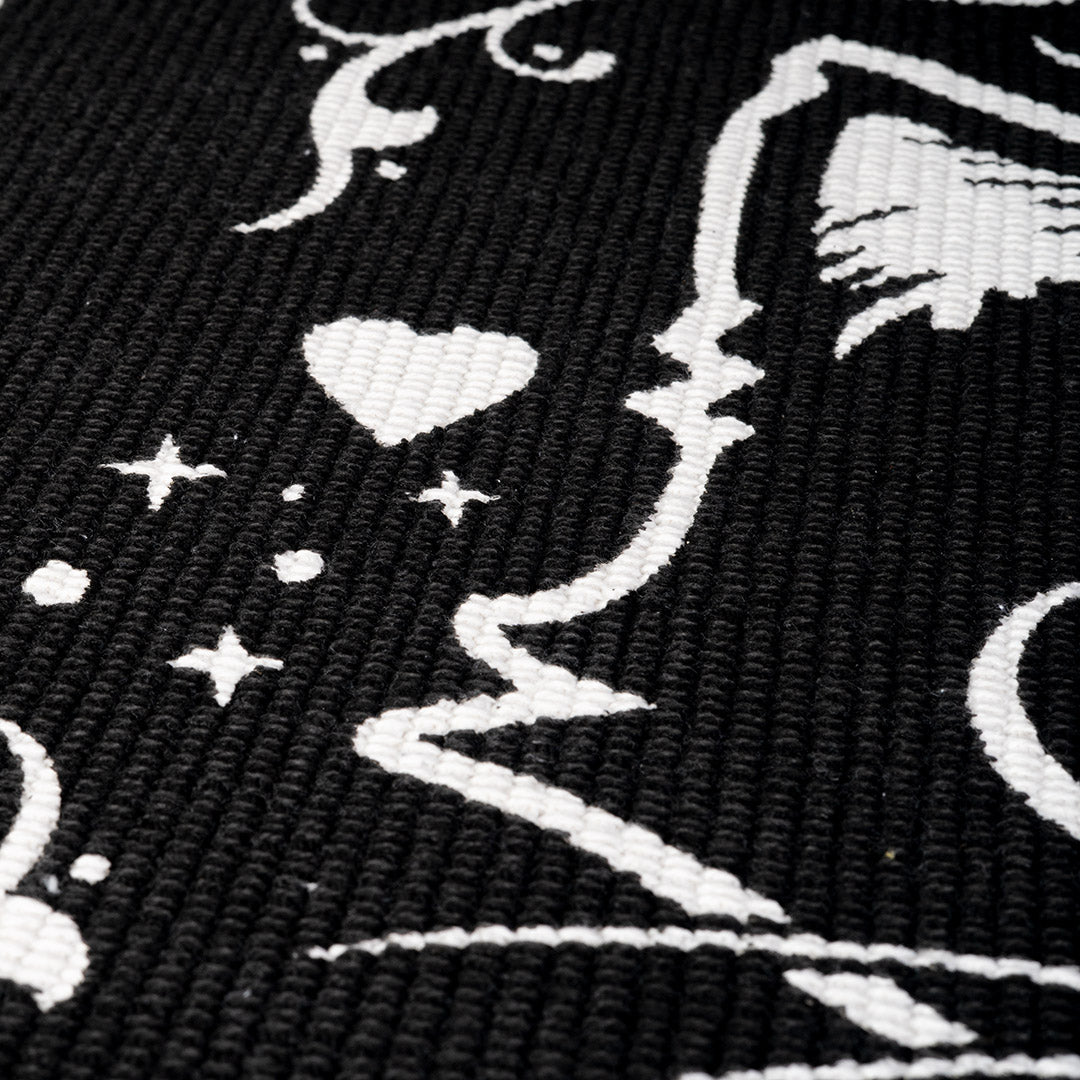 Closeup of rug fibers, black and white