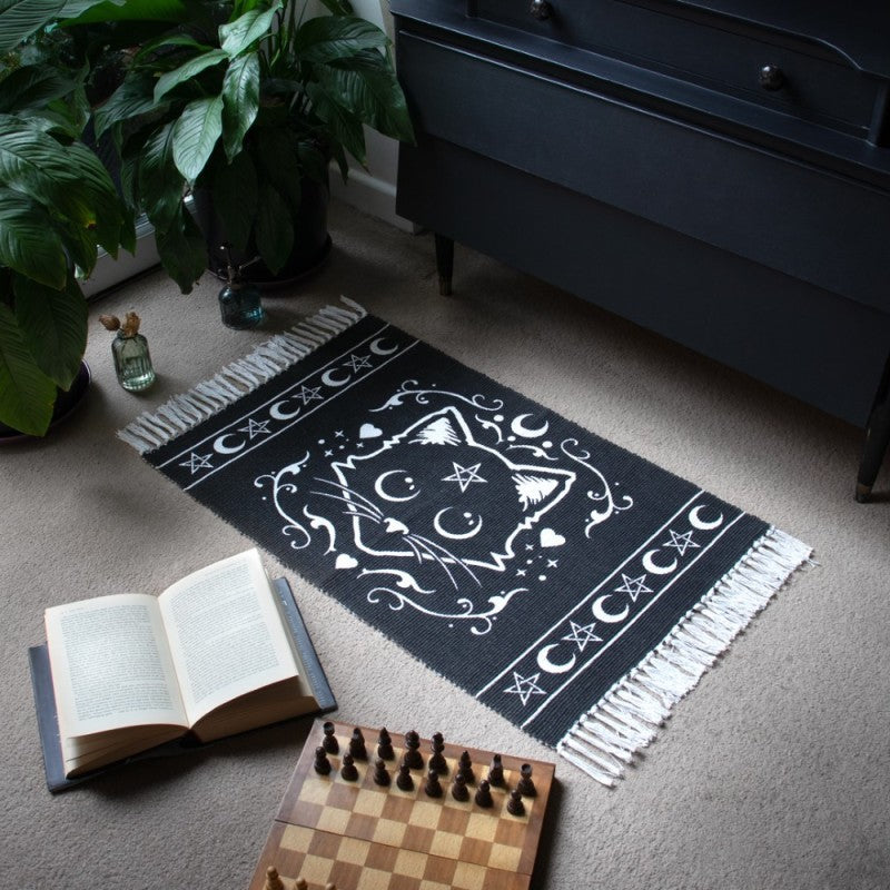 Cotton rug, white on black with fringe. Cat face with pentacle, moon and heart designs