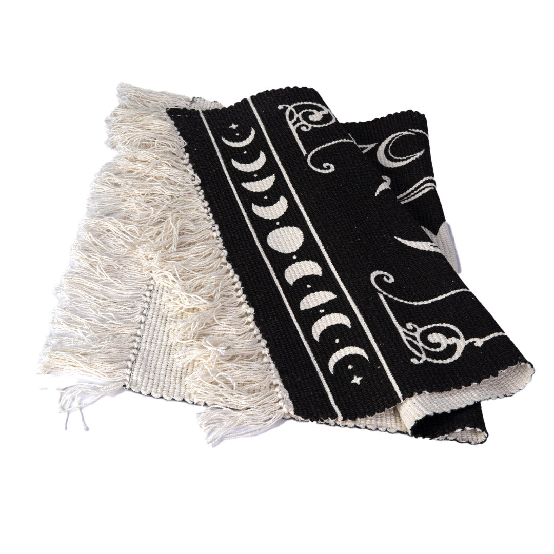 Black and white floor rug with triple moon and stars design