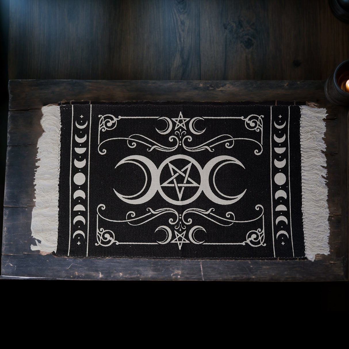 Black and white floor rug with triple moon and stars design