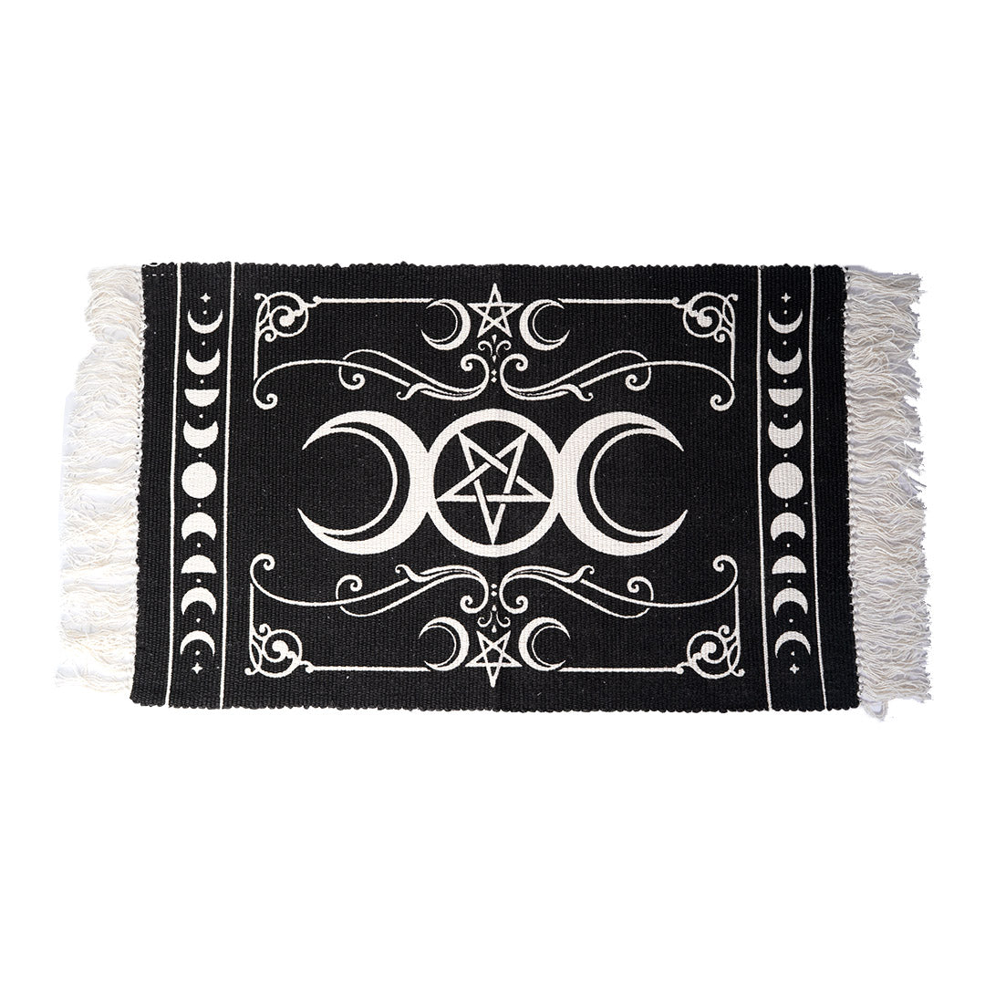 Black and white floor rug with triple moon and stars design