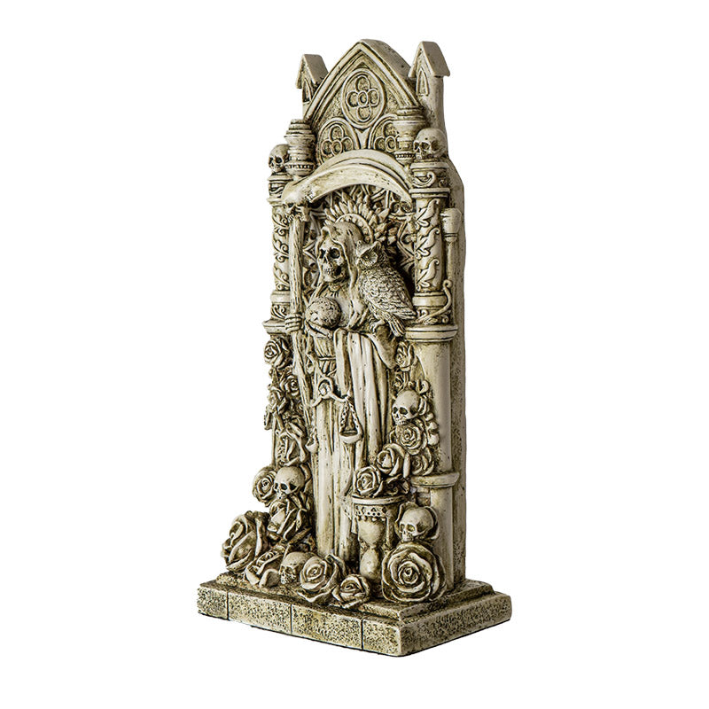 Faux-ivory figurine of Santa Muertes skeleton woman with scythe and owl, surrounded by skulls and roses, hourglass, ornate Gothic architecture