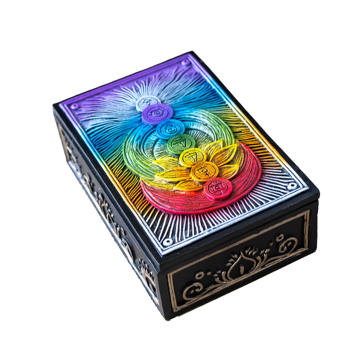 Trinket box with rainbow chakra design on the lid, gold and black outside